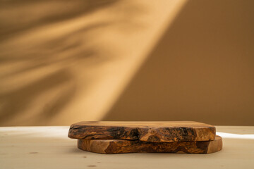 Background for products cosmetics, food or jewellery. Rustic wood podium with natural spot light....