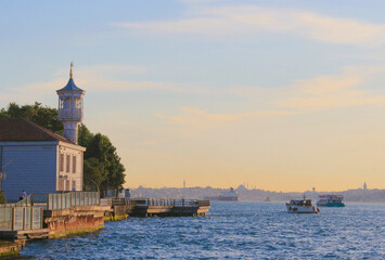 As the sun sets, the Bosphorus and boats in Istanbul