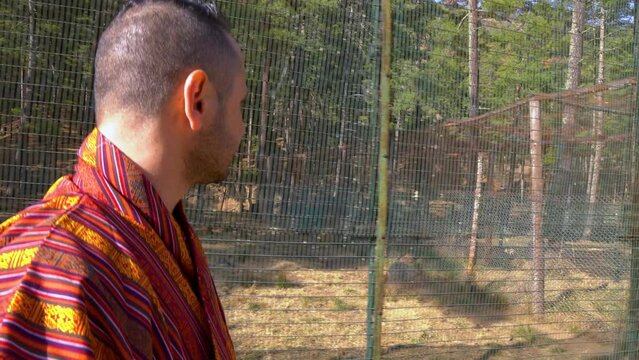 Tourist man visit Motithang Takin Preserve in Thimphu, Bhutan