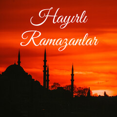 Ramadan Kareem or Hayirli Ramazanlar. Silhouette of Suleymaniye Mosque