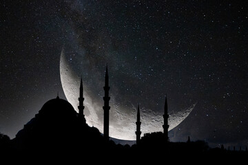 Silhouette of Suleymaniye Mosque with crescent moon and milkyway. Islamic photo