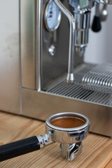 Ground coffee in porta filter and espresso coffee machines