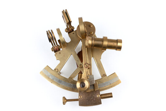 detailed view of a old nautical sextant with optics isolated on white background