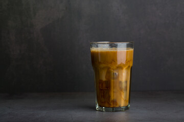 Glass of a iced coffee . Cold brew coffee drink with ice.