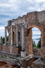 Fototapeta na wymiar Remains of a Greek theater in Taormina - Sicily