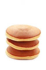 Stack of delicious pancakes isolated on white background.