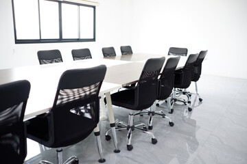Set of tables and chairs in the meeting room.