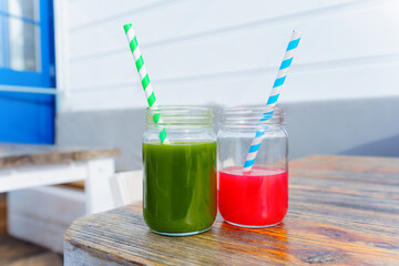 Mason Jars with Organic Juice and Straws