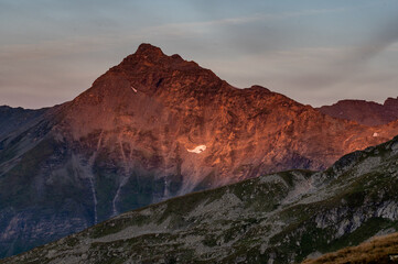 Sunset on top of a mountain in the mountains
in the Austrian Alps in the Hohe Tauern mountains