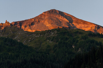 Sunset on top of a mountain in the mountains
in the Austrian Alps in the Hohe Tauern mountains