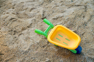 A toy cart used for sand play that children love