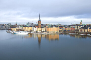 Fototapeta na wymiar View of Riddarholmen Island (Knight's Island) on a cloudy March day. Stockholm, Sweden