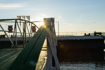 The sunrise paints the sky with a spectacular array of colors, casting a golden glow over the...