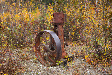 Abandoned mining equipment from the Klondike gold rush era in the vicinity of Dawson City, Canada
