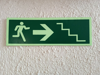 
Emergency exit ladder with arrow for security reasons pleat