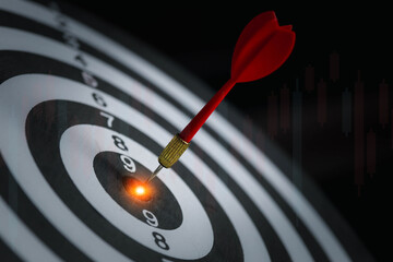 red dart arrow hitting on target is a target of business focus and winner concept.