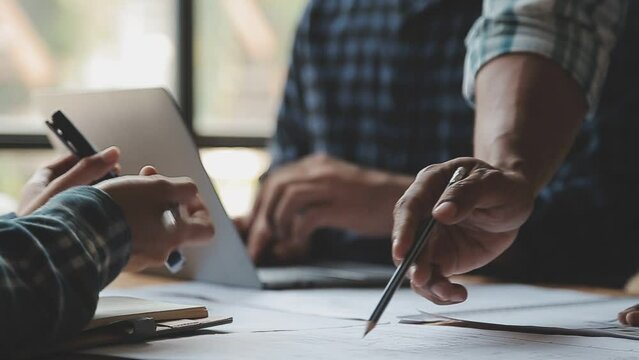 Construction and structure concept of Engineer or architect meeting for project working with partner and engineering tools on model building and blueprint in working site, contract for both companies.