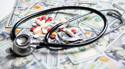 money fee for expensive medicine in closeup selective focus. pills of expensive medicine