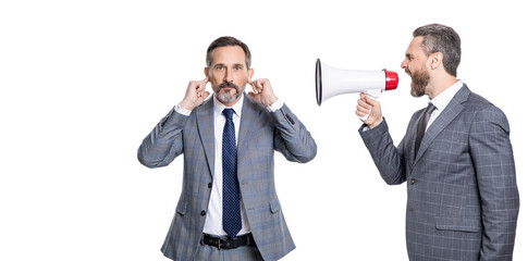 businessmen ignore shouting in megaphone at white studio. businessmen ignore shouting