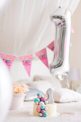 One year birthday decorations for beautiful girl. Girls style. A lot of balloons pink and white style.