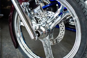 Photo sur Plexiglas Moto Detailed front wheel with chrome spokes of custombike custom motorcycle or chopper bike