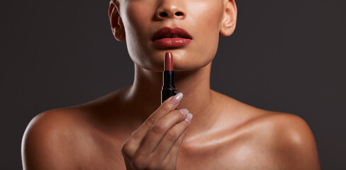 Beauty, makeup and lips of woman with lipstick in studio for cosmetics, skincare products and...
