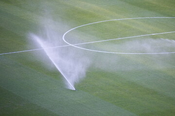 Soccer field grass irrigated for maintenance	