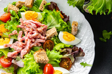 bacon salad, Vosges salad, egg, crouton, lettuce, salad dressing vinaigrette Lorraine cuisine healthy meal food snack on the table copy space food background rustic top view