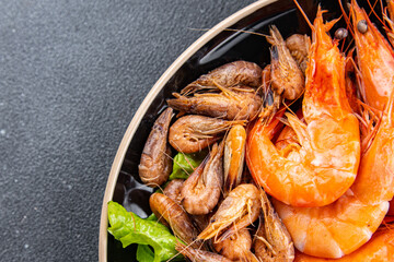 shrimp prawn fresh seafood plate meal food snack on the table copy space food background rustic top view pescatarian diet