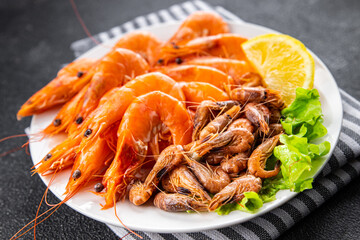 shrimp prawn fresh seafood plate meal food snack on the table copy space food background rustic top view pescatarian diet