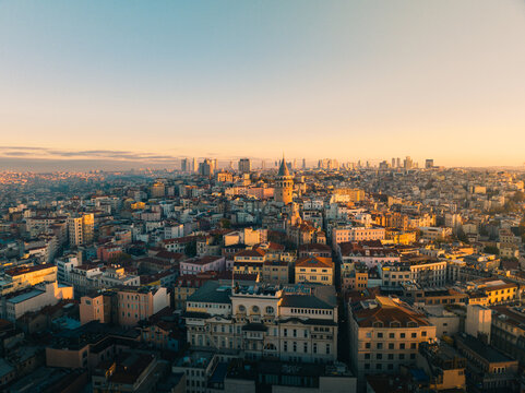 Aerial view of the Galata tower and skyline of Istanbul at sunrise. © paul