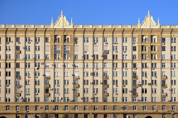 Urban residential stalinist building front view close up