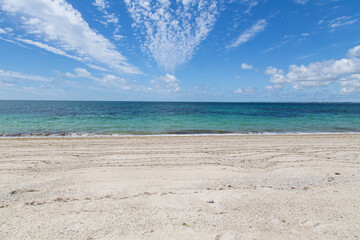 Like in paradise - beautiful cloudy sky, the atlantic ocean with clear turquoise water and a sandy...