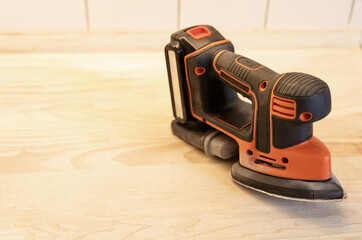 Work with a grinder on wood. Work tool.