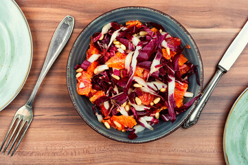 Colorful salad with chicory, healthy meal