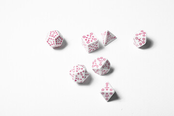 Gaming dices closeup on white background isolated for dungeons, dragons and fantasy roleplaying	