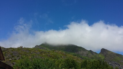 Fototapeta na wymiar clouds above mountains in Norway