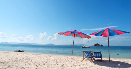 View of Blue ocean white sand beach nature tropical Island. Small wild beach chairs relaxing. landscape Island. Sea background at Phuket Andaman ocean