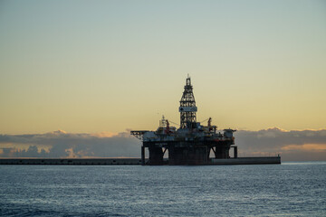 Offshore drilling rig during sunrise