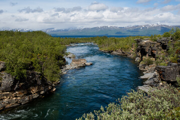 Beautiful natural landscape in the north. Canyon and mountain river. Tourist attraction in Finland. Amazing scenic outdoor view. Scandinavian nature in summer