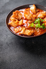 chicken tomato sauce, vegetables healthy meal food snack on the table copy space food background rustic top view