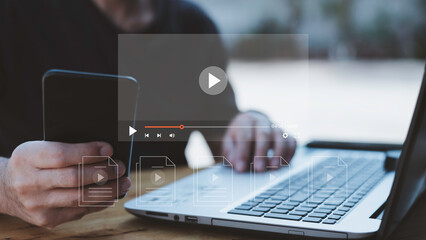 Man using mouse and keyboard for streaming online on virtual screen, watching video on internet, live concert, show or tutorial, content online.