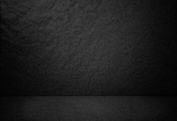 dark black studio background. black abstract stone cement floor and wall backgrounds, room, interior, for display products. montages background for product showcase. empty room grungy stage backdrop.