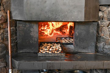 Baking empanadas in a Argentinian oven kitchen. Mendoza Argentina.