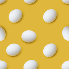 Seamless pattern of white chicken eggs on yellow background. Minimal food concept. Easter with Copy Space.