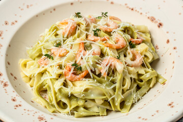 Tagliatelle with shrimps bechamel sauce, thyme. Restaurant menu, dieting, cookbook recipe top view