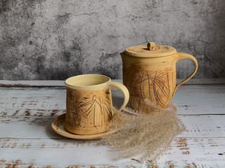 Unique ceramics. Thread-like pattern.Inside the glaze. Cup and saucer, jug.