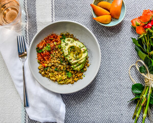 Vegan Avocado Lentil Bowl colorful flat lay, top down composition, eat with your eyes