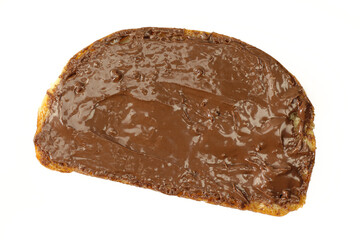 Bread slice with sweet chocolate cream spread on top isolated on white background