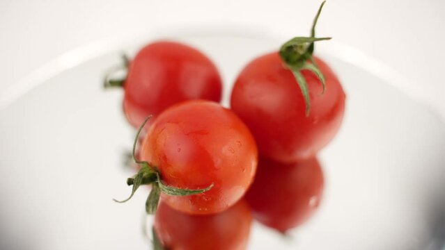 isolated tomatoes with white background and rotation movement